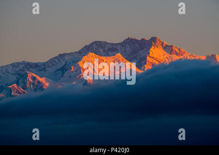 Dramatic landscape Kangchenjunga mountain with colorful from sunlight at Sandakphu, north of India Stock Photo