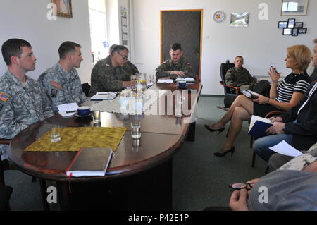 Capt. Niels Madsen and Staff Sgt. Arthur Kleeb of the 457th Civil Affairs Battalion based in Grafenwoehr, Germany discuss with the mayor of Wegorzyno, Poland, town officals, and the CIMIC Support Team during Anakonda 2016. Exercise Anakonda 2016 is a premier training event for U.S. Army Europe and participating nations and demonstrates that the United States and partner nations can effectively unite together under a unified command while training on a contemporary scenario. (Photo by Sgt. Dennis Glass) Stock Photo