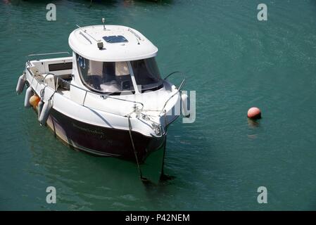 Small fishing boat: a small sea-going craft moored in Folkestone harbour Stock Photo