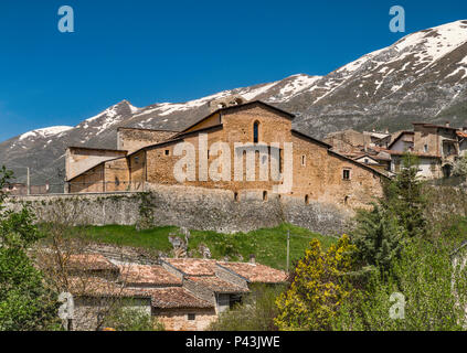 Chiesa di Santa Maria Assunta, 12th century, Romanesque style church in Assergi, Corno Grande massif, Gran Sasso-Laga National Park, Abruzzo, Italy Stock Photo