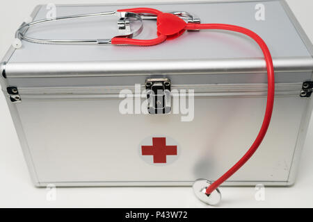 Anodised Aluminium First Aid Box with Stethoscope. Stock Photo
