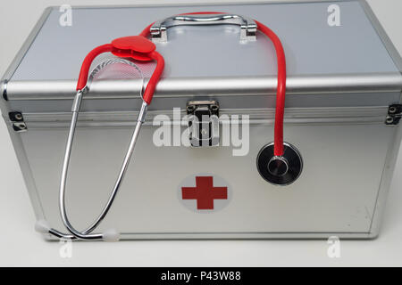 Anodised Aluminium First Aid Box with Stethoscope. Stock Photo