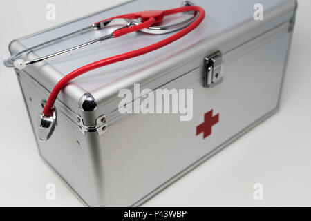 Anodised Aluminium First Aid Box with Stethoscope. Stock Photo