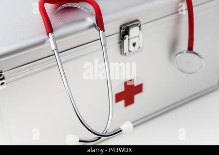 Anodised Aluminium First Aid Box with Stethoscope. Stock Photo