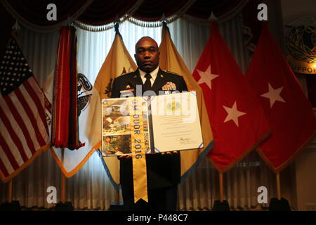 Command Sgt. Maj. Levi G. Maynard led the inductees through reciting ...