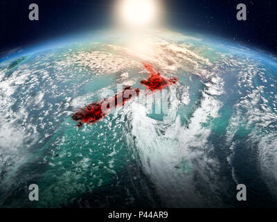 Sunrise above New Zealand highlighted in red on model of planet Earth in space with visible country borders. 3D illustration. Elements of this image f Stock Photo