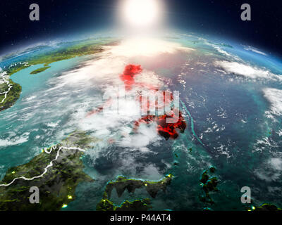 Sunrise above Philippines highlighted in red on model of planet Earth ...