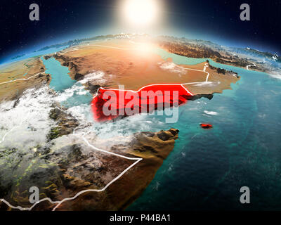 Sunrise above Yemen highlighted in red on model of planet Earth in space with visible country borders. 3D illustration. Elements of this image furnish Stock Photo