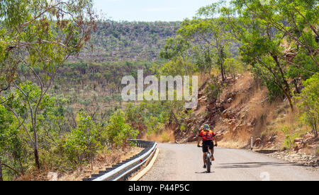 Gibb Challenge 2018 a cyclist in Jersey and bib riding a fatbike on Gibb River Road Kimberley Australia Stock Photo
