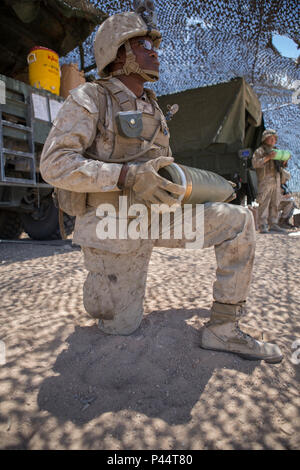 U.S. Marines load a M777 lightweight Howitzer during a Tactical Air ...