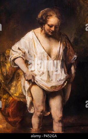 Painting of a Woman Bathing in a Stream by Rembrandt dated 1654 Stock Photo