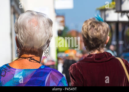 Women walking along High Street at Christchurch, Bournemouth, Dorset UK  in May Stock Photo