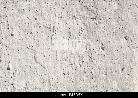 Concrete light grey old wall texture. Close-up white cement surface background. Stock Photo