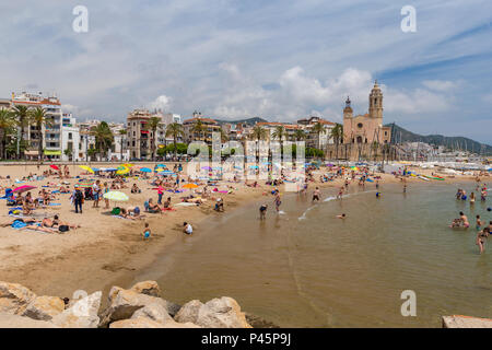 Sunny day on the beach in a small spanish village Sitges, 17. 06. 2018 Spain Stock Photo