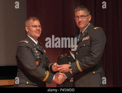 Capt. John T. Green right a graduate of the Internal Medicine