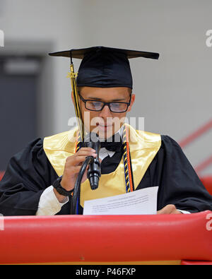 On June 25, 2016, a cadet corps commander delivered the class speech during the 2015-2 graduation at Texas ChalleNGe Academy-West in Iraan, Texas. After completing the 22-week residential phase of this Department of Defense alternative education program, 30 cadets earned a GED, two earned a high school diploma, 13 earned both, and others recovered credits. The program is administered through the Texas National Guard's Joint Counterdrug Taskforce. Stock Photo