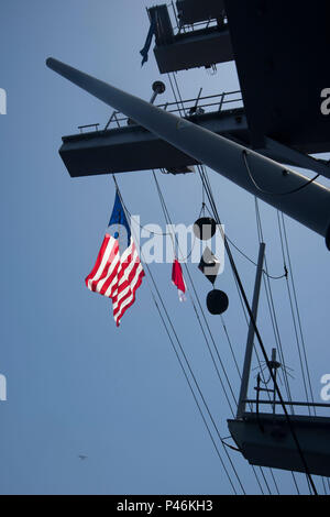 160630-N-WC455-065    MEDITERRANEAN SEA (June 30, 2016) - The battle ensign flies aboard the aircraft carrier USS Dwight D. Eisenhower (CVN 69) (Ike). Dwight D. Eisenhower is deployed in support of Operation Inherent Resolve, maritime security operations and theater security operation efforts in the U.S. 6th Fleet area of operations. (U.S. Navy photo by Mass Communication Specialist Seaman Apprentice Joshua Murray/Released) Stock Photo