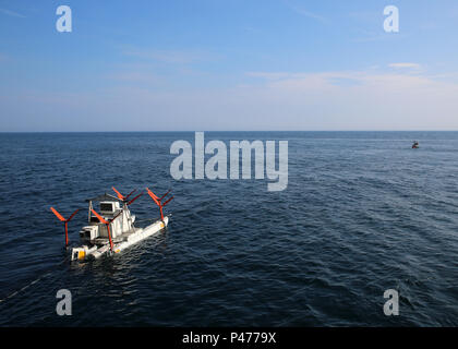 https://l450v.alamy.com/450v/p4779x/atlantic-ocean-june-16-2016-a-mark-105-mine-countermeasure-sled-attached-to-helicopter-mine-counter-measure-squadron-15-hm-15-is-moved-into-position-by-hm-15-sailors-operating-a-rigid-hulled-inflatable-boat-may-16-the-sled-was-launched-and-recovered-by-military-sealift-commands-usns-lewis-b-puller-t-esb-3-based-sailors-and-civil-service-mariner-working-concert-with-hm-15-sailors-during-a-four-day-airborne-mine-countermeasure-deployment-training-exercise-us-navy-photograph-by-bill-mestareleased-p4779x.jpg