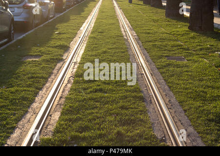 Perspective shot of train rail at summertime at Izmir in Turkey Stock Photo