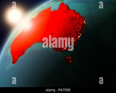 Australia during sunset highlighted in red on planet Earth with clouds ...