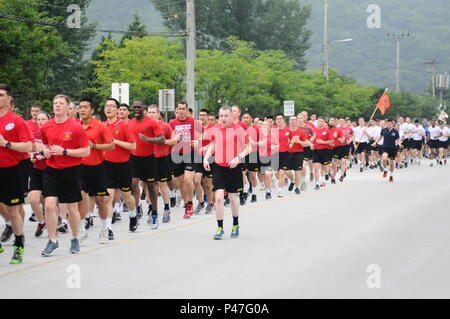 Soldiers from 70th Brigade Support Battalion, 210th Field Artillery Brigade, 2nd Infantry Division/ ROK-U.S. Combined Division began celebrating the 4th of July weekend by conducting a 'red, white & blue' esprit de corps run at Camp Casey, June 30. Stock Photo