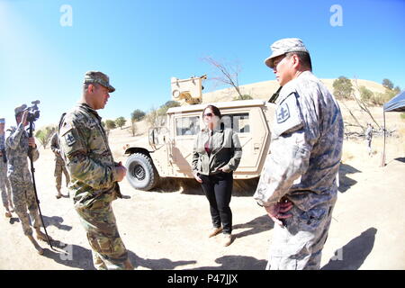 The Honorable Debra S. Wada, Assistant Secretary of the Army (Manpower & Reserve Affairs) visit Soldiers of the 29th Infantry Brigade Combat Team during their Exportable Combat Training Capability exercise Jun 16 at Camp Roberts California. XCTC focuses on fully instrumental and realistic collective training to certify platoon & company level training proficiency in coordination with First Army. Commanders and leaders assess their Soldiers strengths and weaknesses during a video review session after training which aids in their proficiency as an individual, team, platoon, unit and brigade. (U. Stock Photo