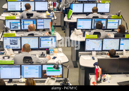 cctv screen. CCTV monitors in control room at Cardiff Central Police ...
