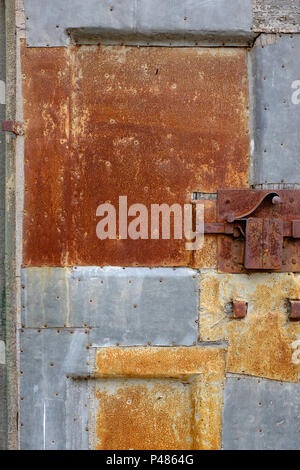 rusty metal door, tuscany, italy Stock Photo