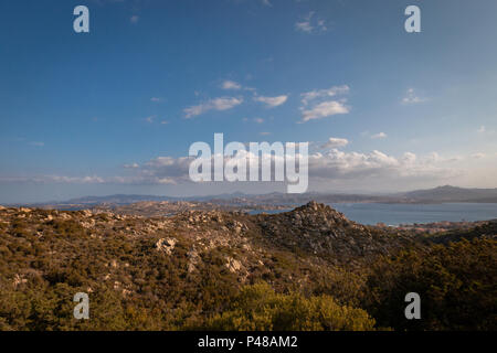 View from the Italian island of La Maddalena to Palau on the Italian island of Sardinia with boats and ferries sailing back and forth between the isla Stock Photo