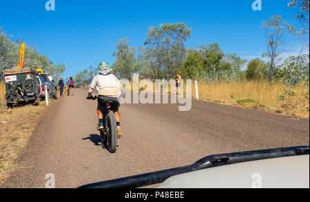 Gibb Challenge 2018 a cyclist in Jersey and bib riding the Gibb River Road Kimberley Australia Stock Photo