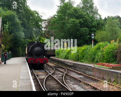 Steam Engline Repulse pulling carriages into Lakeside railway station from Haverthwaite stationa 3.5 mile journey on Furness Railway Branch Line Cumbr Stock Photo