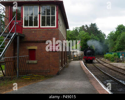 Steam Engline Repulse passing signal box Lakeside railway station from Haverthwaite station a 3.5 mile journey on Furness Railway Branch Line Cumbria  Stock Photo