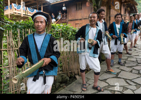 Musicians play bamboo and string instruments, Yao ethnic minority village Yao Shan, Libo, Guizhou Province, China Stock Photo