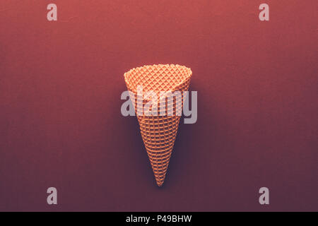 Ice cream cone from above, minimal flat lay composition with copy space Stock Photo