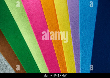 Colored felt texture background, grey, brrown, green, lime, pink, orange, yellow, purple, light blue, dark plue Stock Photo