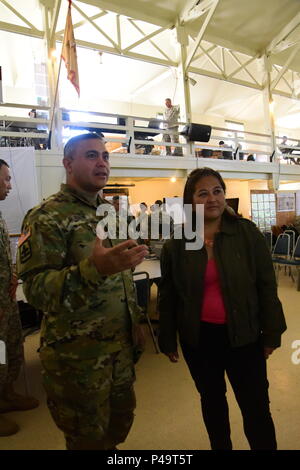 The Honorable Debra S. Wada, Assistant Secretary of the Army (Manpower & Reserve Affairs) visit Soldiers of the 29th Infantry Brigade Combat Team during their Exportable Combat Training Capability exercise Jun 16 at Camp Roberts California. XCTC focuses on fully instrumental and realistic collective training to certify platoon & company level training proficiency in coordination with First Army. Commanders and leaders assess their Soldiers strengths and weaknesses during a video review session after training which aids in their proficiency as an individual, team, platoon, unit and brigade. (U. Stock Photo