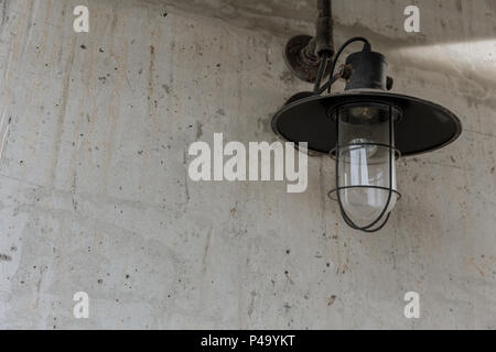 industrial street light decoration. white wall lighting vintage retro style in black and white with space for text. Stock Photo