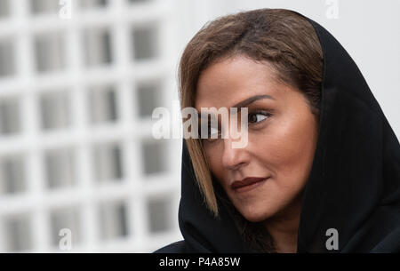 Germany, Berlin. 21st June, 2018. Princess Lamia Bint Majed Saud Al-Saudi (r) of Saudi Arabia, director of the Alwaleed Philanthropies Foundation, is following the press conference in the Pergamon Museum. The Museum of Islamic Art of the State Museums received a generous grant of Alwaleed Philanthropies. Over a period of ten years, the areas of exhibition development and cultural education will be promoted. Credit: Paul Zinken/dpa/Alamy Live News Stock Photo