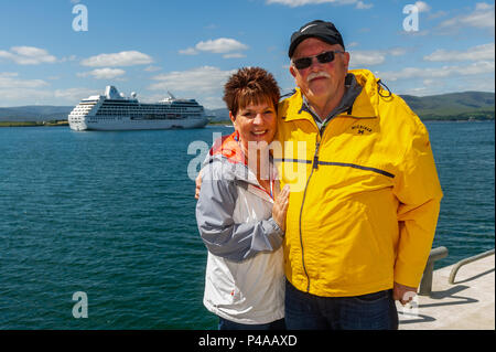 Bantry, Ireland. 21st June, 2018. Cruise Liner 'Nautica' made a call to Bantry Bay early this morning. The Marshall Island flagged vessel, owned by Oceana Cruises, has 680 passengers aboard, currently enjoying a tour around the British Isles before arriving in Dublin on 28th June. Cruise passengers Kathy and John Richardson from Michigan, USA, thought Bantry was 'wonderful' and are pictured before being transported back to the ship after a day in Bantry. Credit: Andy Gibson/Alamy Live News. Stock Photo