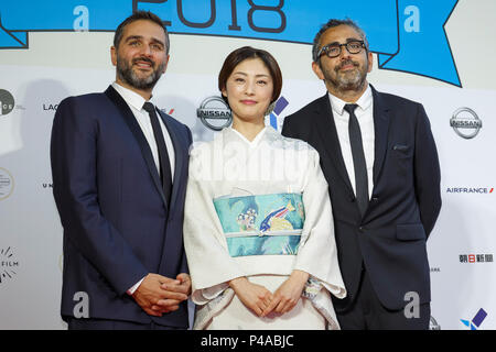 (L to R) French director Oliver Nakache, Japanese actress and Festival Muse Takako Tokiwa and French director Eric Toledano, pose for the cameras during a red carpet before the opening ceremony of the Festival du Film Francais au Japon 2018 at Yokohama Minato Mirai Hall on June 21, 2018, Yokohama, Japan. This year 15 movies will be screened during the festival from June 21st to 24th. (Photo by Rodrigo Reyes Marin/AFLO) Stock Photo