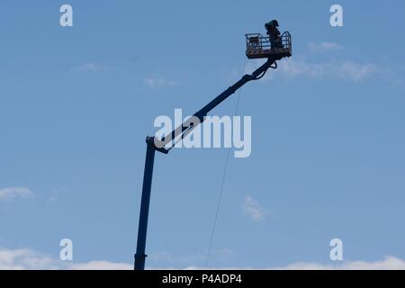 Chester-le-Street, England 21 June 2018. A cameraman on a high lift filming the fourth ODI between England and Australia at the Emirates Riverside. Credit: Colin Edwards/Alamy Live News. Stock Photo