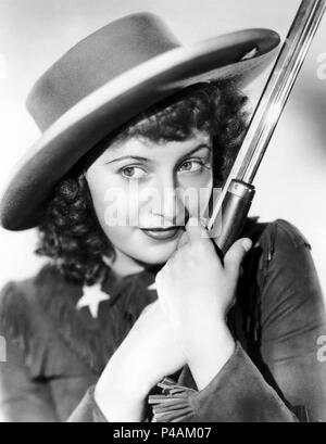 Original Film Title: ANNIE OAKLEY.  English Title: ANNIE OAKLEY.  Film Director: GEORGE STEVENS.  Year: 1935.  Stars: BARBARA STANWYCK. Credit: RKO / Album Stock Photo