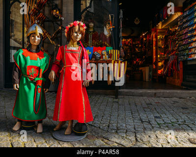 Dolls dressed in medieval clothes in the historic centre of Carcassonne, a hilltop town in southern France Stock Photo