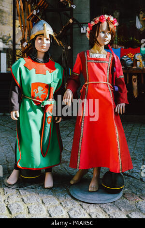 Dolls dressed in medieval clothes in the historic centre of Carcassonne, a hilltop town in southern France Stock Photo