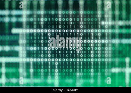 power of big data. binary code information bit on computer monitor screen display. green light text number one and zero. blur defocus blue bokeh light Stock Photo