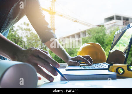 Architect engineer working concept and construction tools or safety equipment on table. Stock Photo