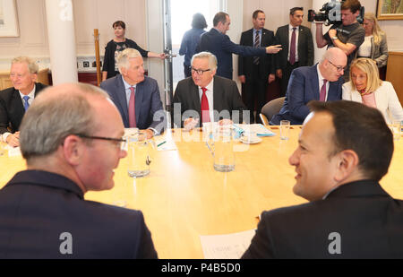 President of the European Commission, Jean-Claude Juncker (centre) and Michel Barnier, EU Chief Negotiator for Brexit (rear second left) during a meeting with Taoiseach, Leo Varadkar (bottom right) at Government Buildings, during his visit to Dublin, ahead of the European Council on 28-29 June to discuss Brexit and other issues currently on the European agenda. Stock Photo