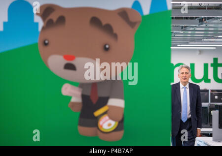 Chancellor of the Exchequer Philip Hammond visits Nutmeg, a British digital wealth manager in south London, ahead of delivering his speech at the Lord Mayor's Dinner for the Bankers and Merchants of the City of London at Mansion House, in the City of London. Stock Photo