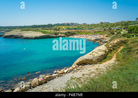 view of crowded sardinian beach of Balai, inside the city of Porto Torres, in sunny day of summer Stock Photo