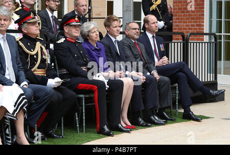 (left to right) Lord Howe, Sir John Peace, Prime Minister Theresa May, Hugh Grosvenor, 7th Duke of Westminster, Prince Salman bin Hamad bin Isa Al Khalifa and the Duke of Cambridge attend the official handover to the nation of the newly built Defence and National Rehabilitation Centre (DNRC) at the Stanford Hall Estate, Nottinghamshire. Stock Photo